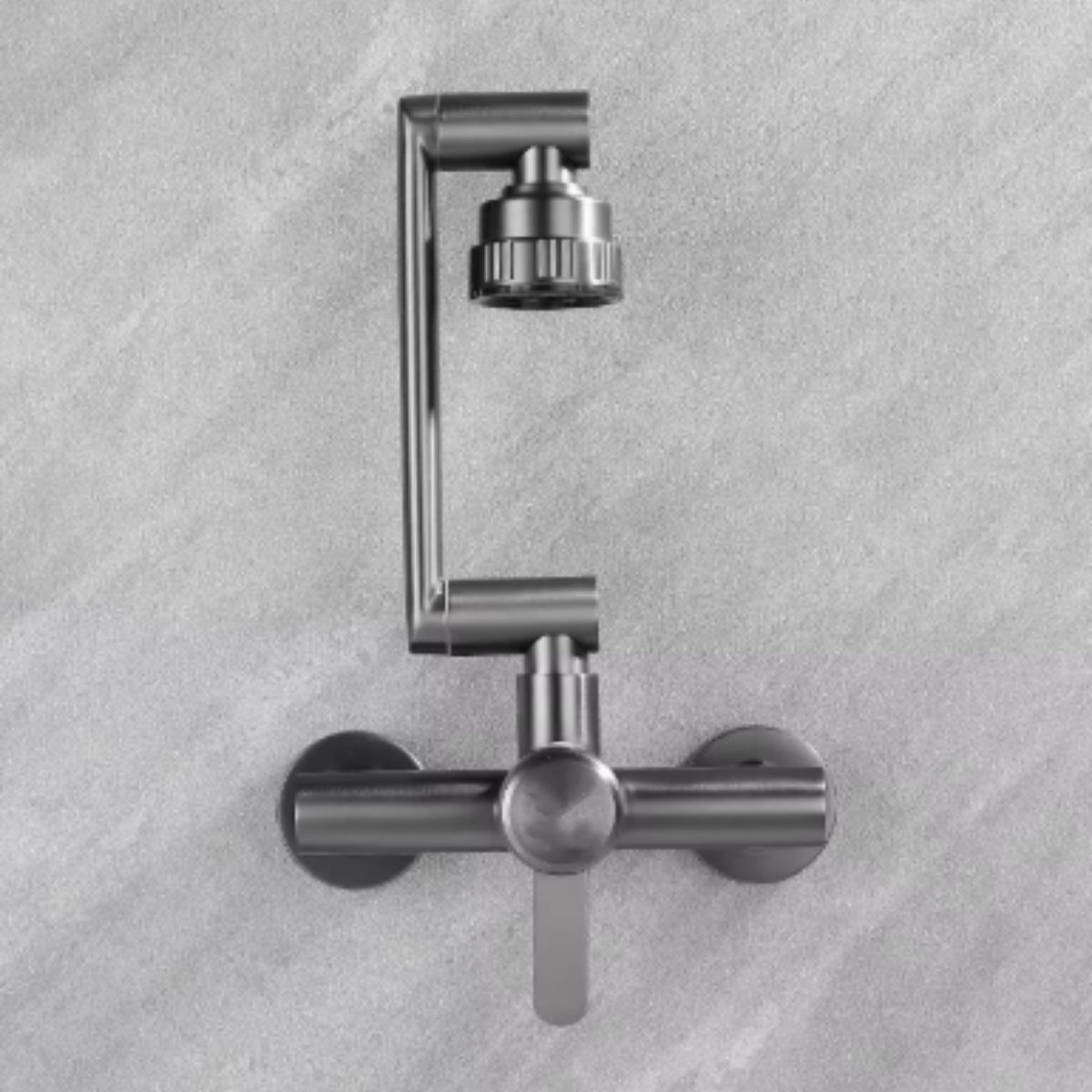 Robinet de cuisine mural NOVIK en inox installé sur un mur gris