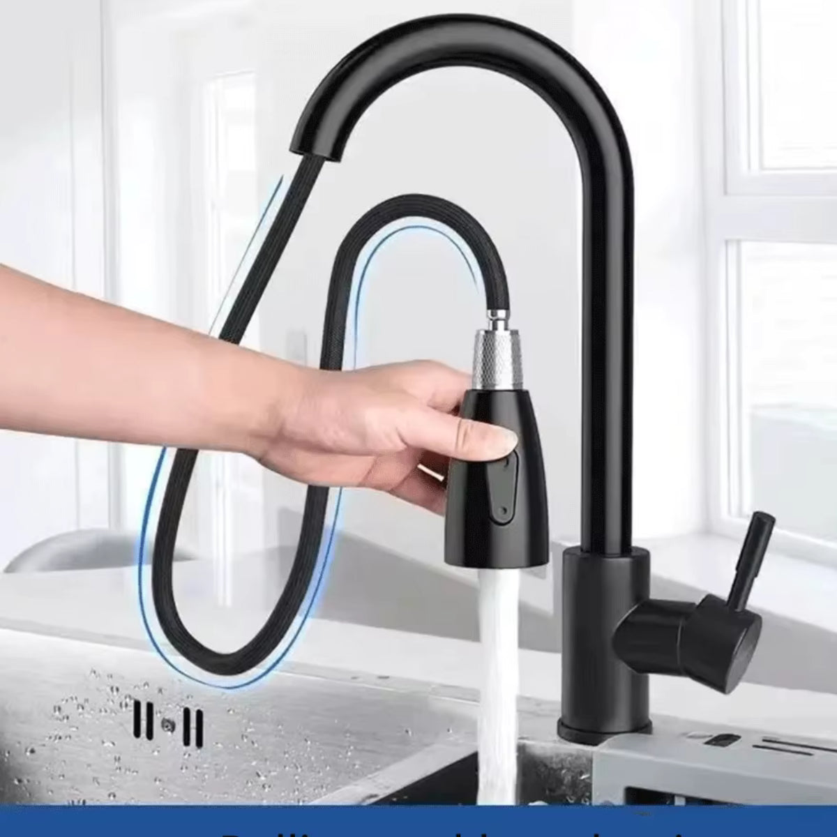 Douchette du robinet de cuisine ODVAR tirée hors du bec, flexible apparent